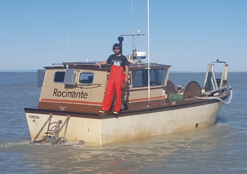 Pinnacle Geo founder Drew Lindow aboard his commercial fishing vessel on the Copper River Delta